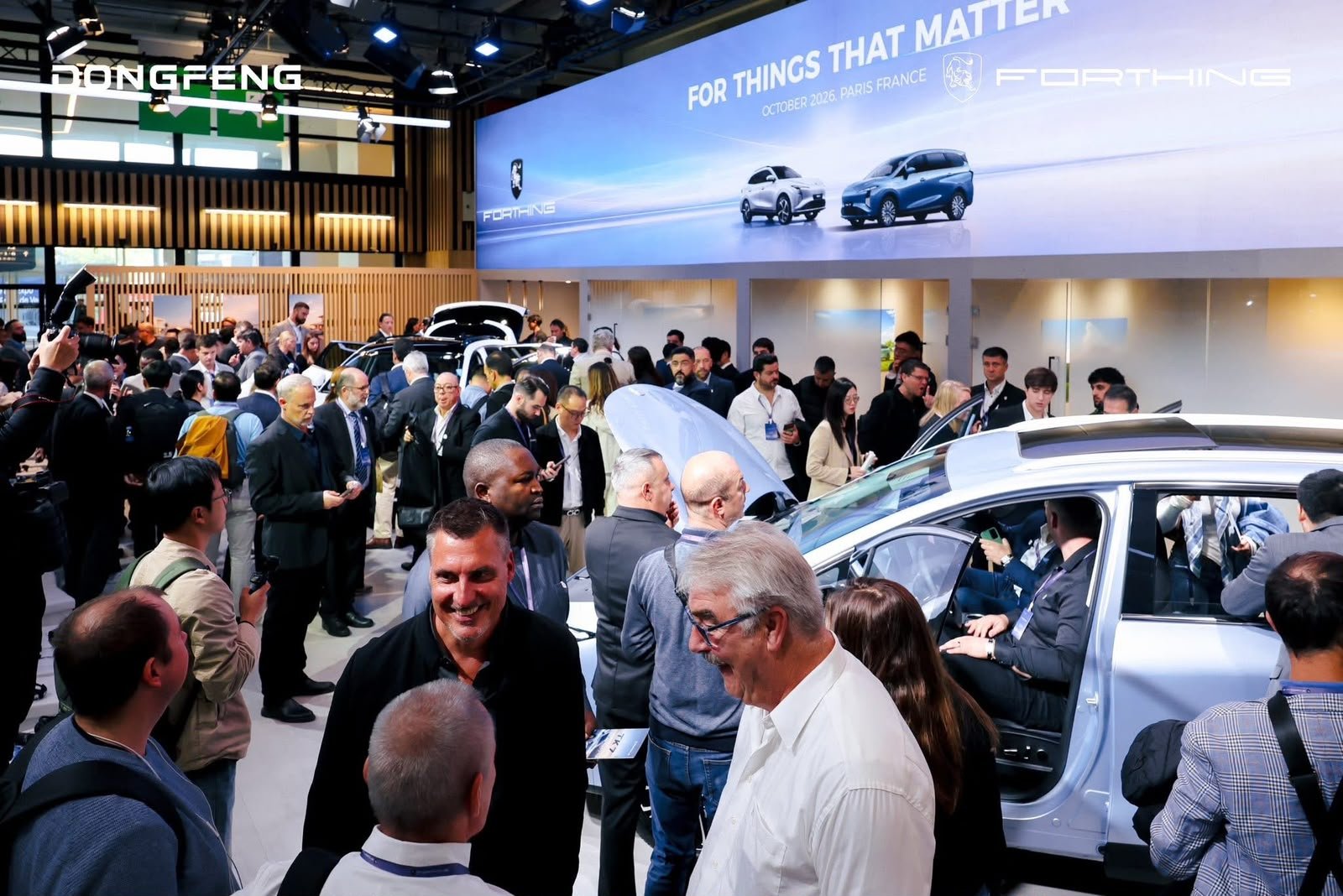 Jeeh Motors at the 2026 Paris Motor Show: Bringing FORTHING's Next Generation of Electric Mobility Closer to Ethiopia 4 Crowd and vehicles at the FORTHING stand during the 2026 Paris Motor Show in Hall 7.1